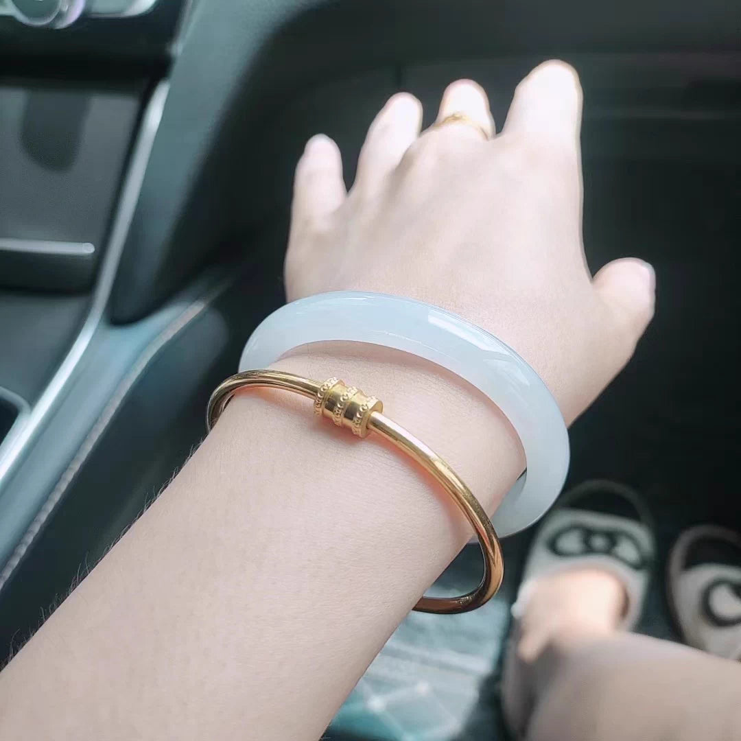 The "Lunar Whisper" Icy White Moonlight Jadeite Bangle (60mm)