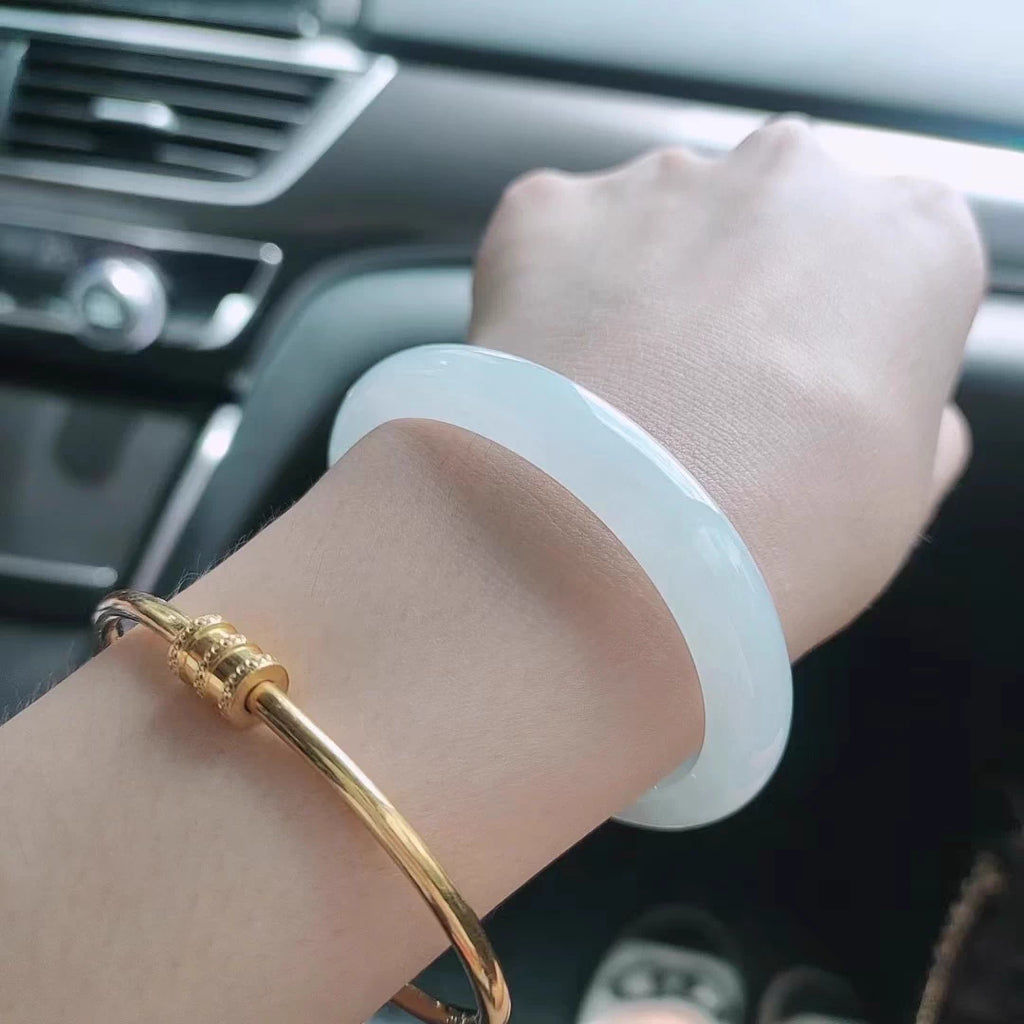 The "Lunar Whisper" Icy White Moonlight Jadeite Bangle (60mm)