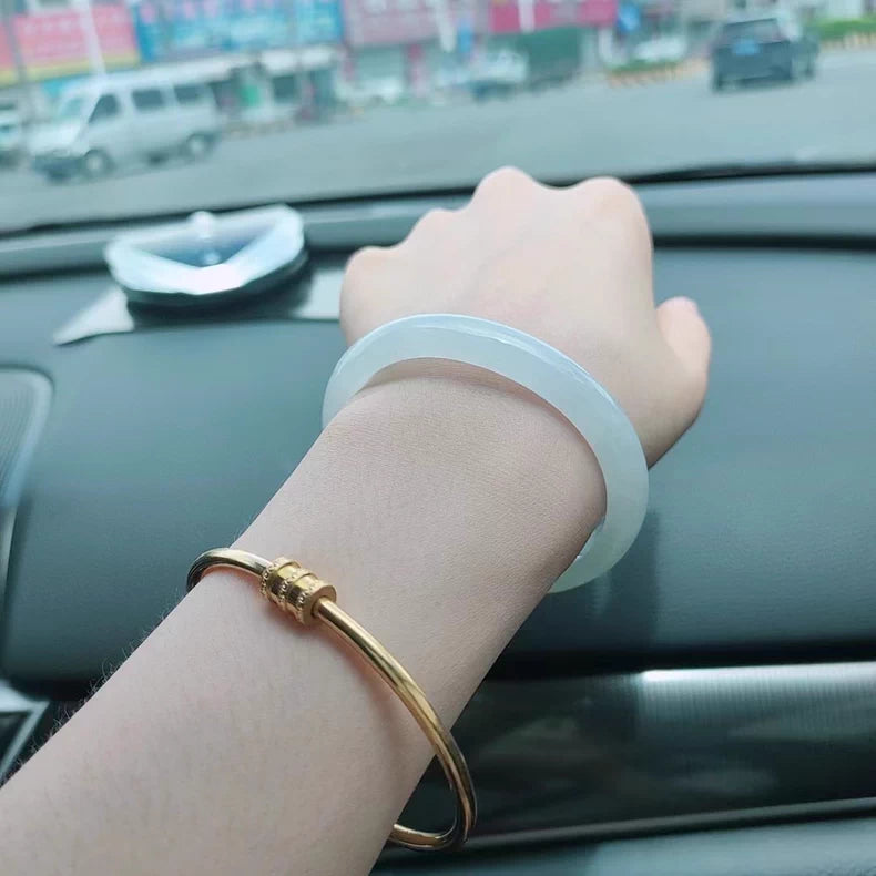 The "Lunar Whisper" Icy White Moonlight Jadeite Bangle (60mm)