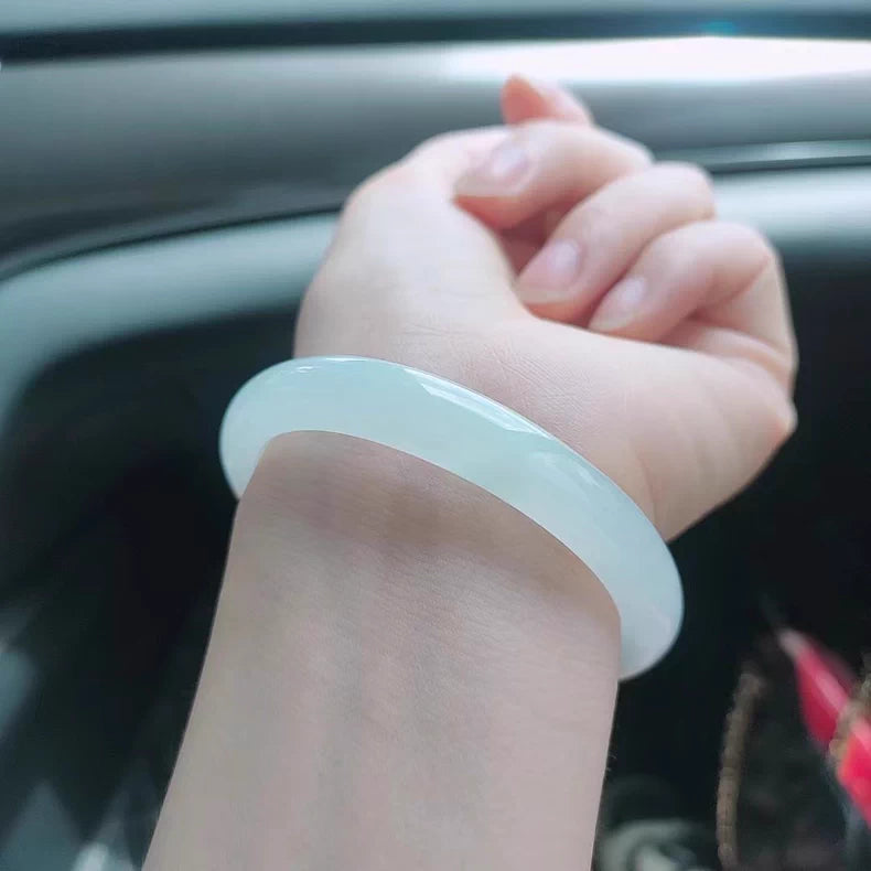 The "Lunar Whisper" Icy White Moonlight Jadeite Bangle (60mm)